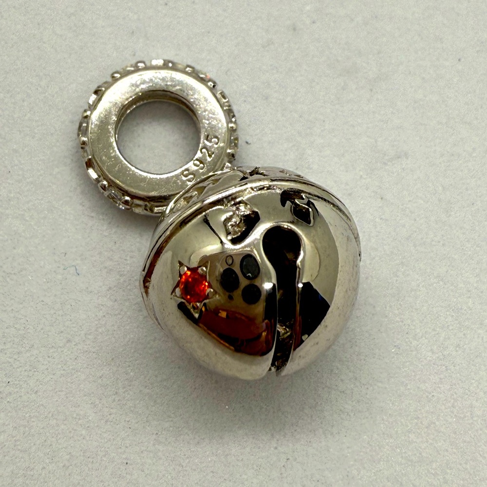 Silver Charm with Red Gemstone